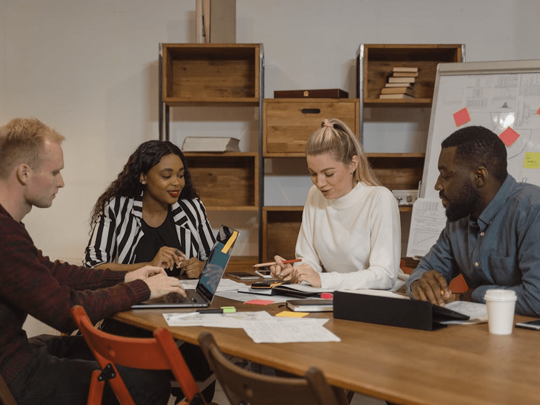 Corporate team meeting around a table